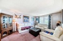 52 Castlebrook Rise Ne, Calgary, AB  - Indoor Photo Showing Living Room 