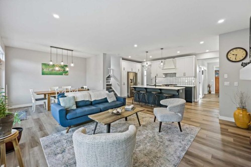 34 Coach Ridge Point Sw, Calgary, AB - Indoor Photo Showing Living Room