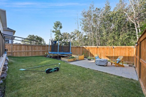 34 Coach Ridge Point Sw, Calgary, AB - Outdoor With Deck Patio Veranda With Backyard