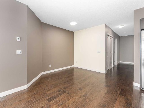 202-15207 1 Street Se, Calgary, AB - Indoor Photo Showing Other Room