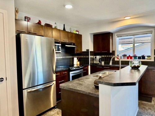 43 Bridlecrest Road Sw, Calgary, AB - Indoor Photo Showing Kitchen With Stainless Steel Kitchen With Double Sink