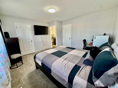 43 Bridlecrest Road Sw, Calgary, AB - Indoor Photo Showing Bedroom