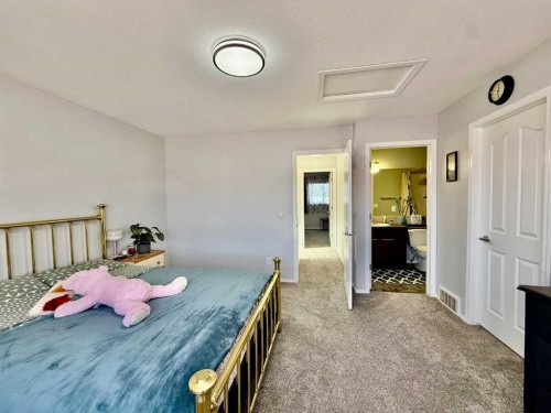 43 Bridlecrest Road Sw, Calgary, AB - Indoor Photo Showing Bedroom
