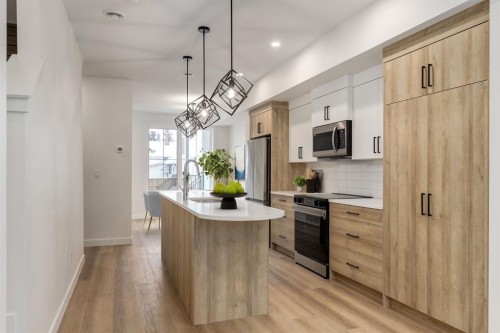 1651 8 Avenue Nw, Calgary, AB - Indoor Photo Showing Kitchen With Upgraded Kitchen