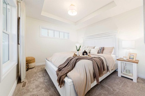 2166 Bayview Drive Sw, Airdrie, AB - Indoor Photo Showing Bedroom