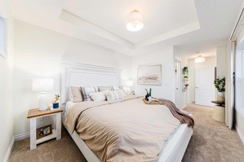 2166 Bayview Drive Sw, Airdrie, AB - Indoor Photo Showing Bedroom