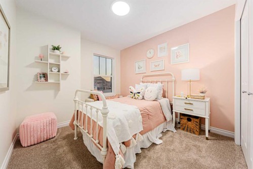 2166 Bayview Drive Sw, Airdrie, AB - Indoor Photo Showing Bedroom
