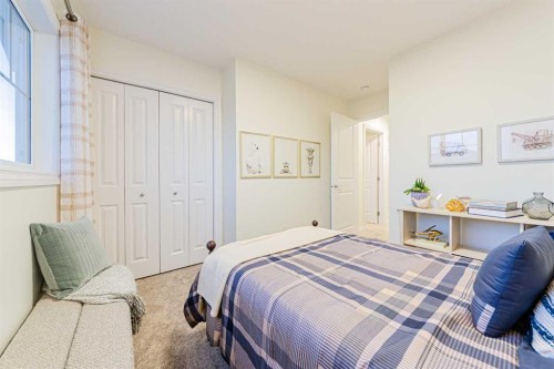 2166 Bayview Drive Sw, Airdrie, AB - Indoor Photo Showing Bedroom