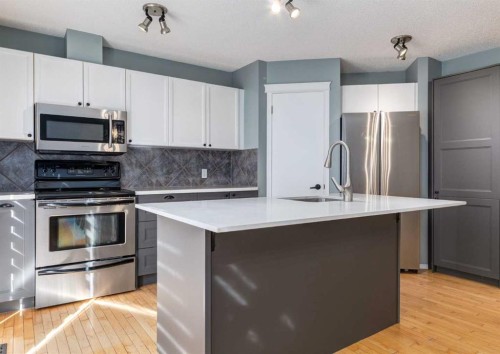 137 Tuscany Springs Way Nw, Calgary, AB - Indoor Photo Showing Kitchen With Upgraded Kitchen