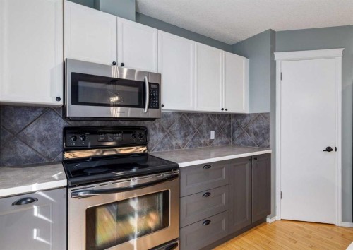137 Tuscany Springs Way Nw, Calgary, AB - Indoor Photo Showing Kitchen