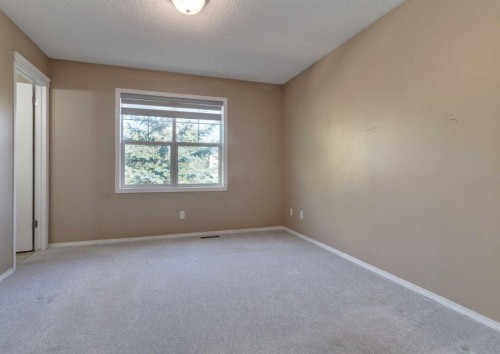 137 Tuscany Springs Way Nw, Calgary, AB - Indoor Photo Showing Other Room