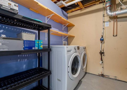137 Tuscany Springs Way Nw, Calgary, AB - Indoor Photo Showing Laundry Room