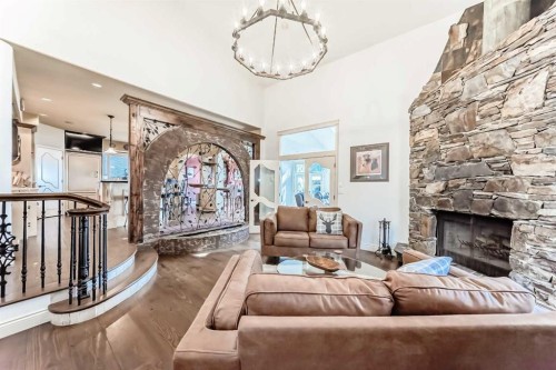 716 West Chestermere Drive, Chestermere, AB - Indoor Photo Showing Living Room With Fireplace