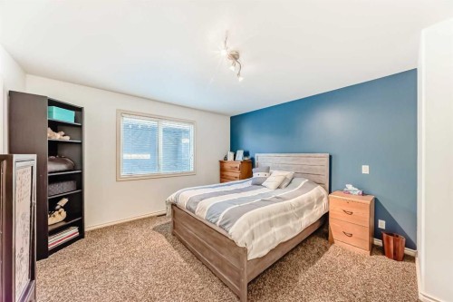 716 West Chestermere Drive, Chestermere, AB - Indoor Photo Showing Bedroom