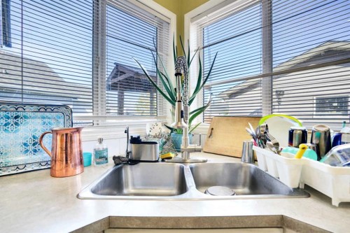 143 Taralea Gardens Ne, Calgary, AB - Indoor Photo Showing Kitchen With Double Sink