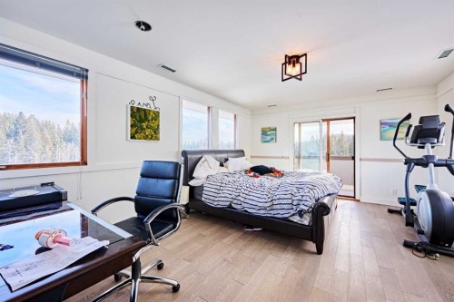 31 Williams Place, Bragg Creek, AB - Indoor Photo Showing Bedroom