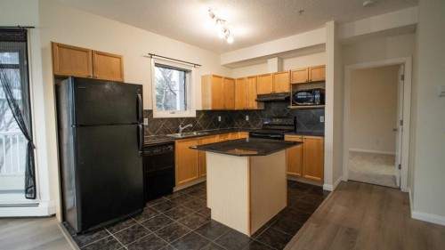202-8 Prestwick Pond Terrace Se, Calgary, AB - Indoor Photo Showing Kitchen