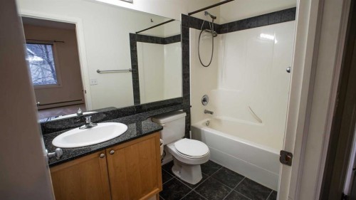 202-8 Prestwick Pond Terrace Se, Calgary, AB - Indoor Photo Showing Bedroom