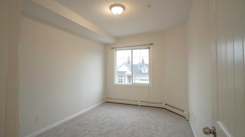 202-8 Prestwick Pond Terrace Se, Calgary, AB - Indoor With Storage
