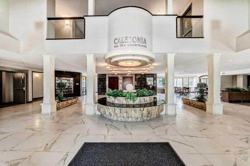 202-8 Prestwick Pond Terrace Se, Calgary, AB - Outdoor With Balcony With Facade