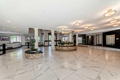 202-8 Prestwick Pond Terrace Se, Calgary, AB - Indoor Photo Showing Other Room
