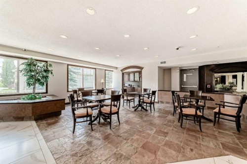 202-8 Prestwick Pond Terrace Se, Calgary, AB - Indoor Photo Showing Dining Room