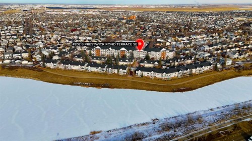202-8 Prestwick Pond Terrace Se, Calgary, AB - Outdoor With Body Of Water With View