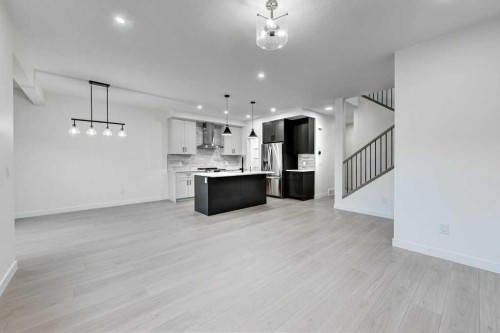 891 Langholm Drive Se, Airdrie, AB - Indoor Photo Showing Kitchen
