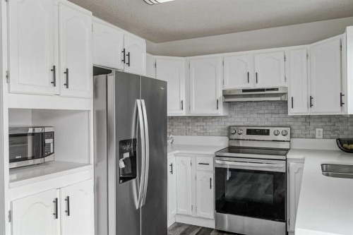 347 Whitefield Drive Ne, Calgary, AB - Indoor Photo Showing Kitchen With Stainless Steel Kitchen With Double Sink