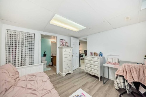 13 Brentwood Drive, Strathmore, AB - Indoor Photo Showing Bedroom