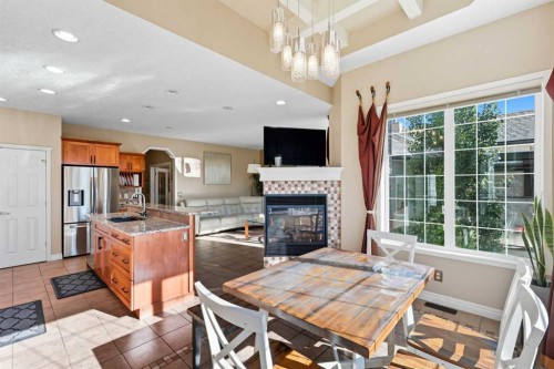 7 Panatella Close Nw, Calgary, AB - Indoor With Fireplace