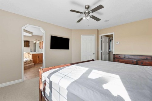 7 Panatella Close Nw, Calgary, AB - Indoor Photo Showing Bedroom