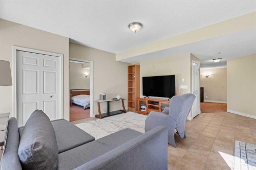 7 Panatella Close Nw, Calgary, AB - Indoor Photo Showing Living Room