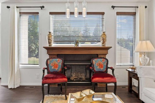 83 Aspen Stone Terrace Sw, Calgary, AB - Indoor Photo Showing Living Room With Fireplace