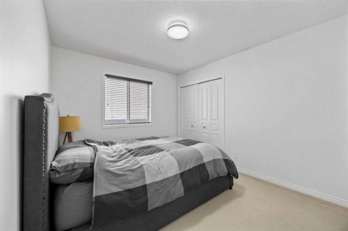 83 Aspen Stone Terrace Sw, Calgary, AB - Indoor Photo Showing Bedroom