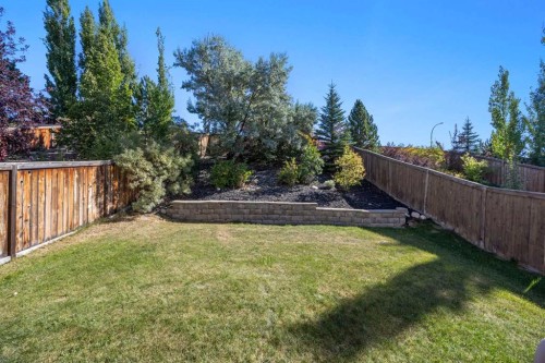 83 Aspen Stone Terrace Sw, Calgary, AB - Outdoor With Backyard