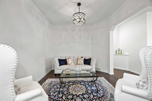 83 Aspen Stone Terrace Sw, Calgary, AB - Indoor Photo Showing Living Room