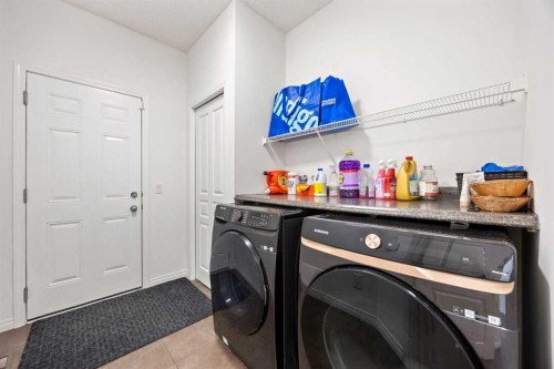 83 Aspen Stone Terrace Sw, Calgary, AB - Indoor Photo Showing Laundry Room