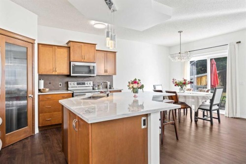 83 Aspen Stone Terrace Sw, Calgary, AB - Indoor Photo Showing Kitchen With Upgraded Kitchen