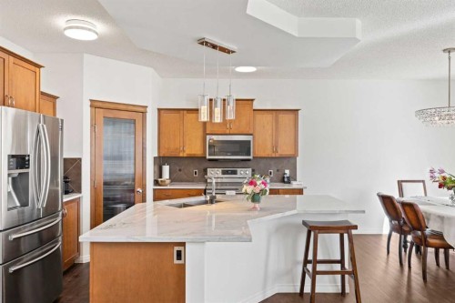 83 Aspen Stone Terrace Sw, Calgary, AB - Indoor Photo Showing Kitchen With Upgraded Kitchen