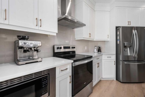 44 Calhoun Common Ne, Calgary, AB - Indoor Photo Showing Kitchen With Stainless Steel Kitchen With Upgraded Kitchen