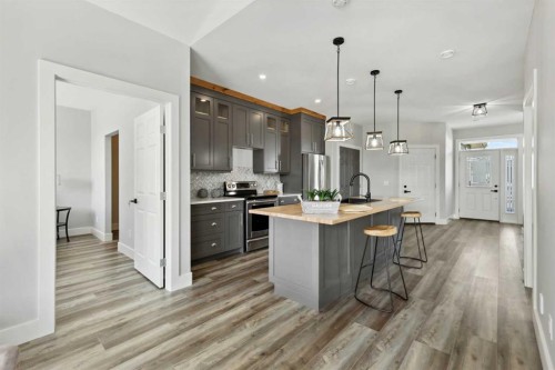 27-610 4 Avenue Sw, Sundre, AB - Indoor Photo Showing Kitchen With Upgraded Kitchen