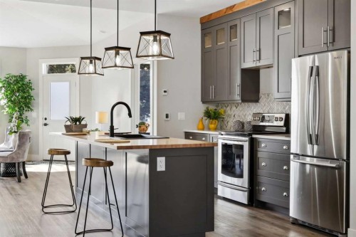 27-610 4 Avenue Sw, Sundre, AB - Indoor Photo Showing Kitchen With Upgraded Kitchen