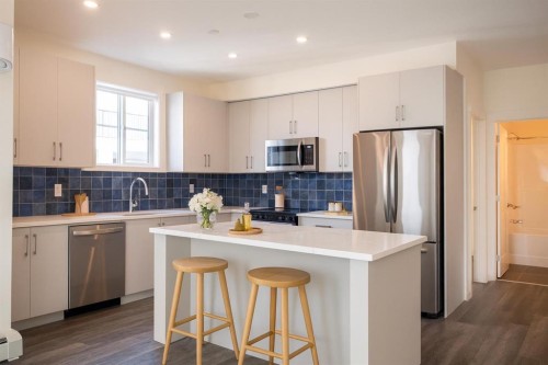 2310-740 Legacy Village Road Se, Calgary, AB - Indoor Photo Showing Kitchen With Stainless Steel Kitchen With Upgraded Kitchen