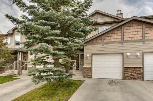 51 Spring Meadows Bay, Okotoks, AB - Outdoor With Facade