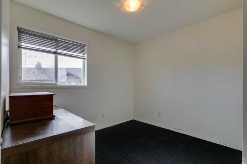51 Spring Meadows Bay, Okotoks, AB - Indoor Photo Showing Other Room