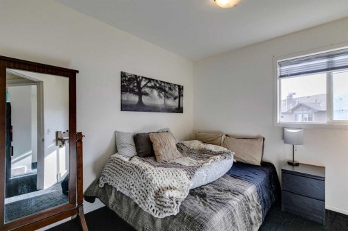 51 Spring Meadows Bay, Okotoks, AB - Indoor Photo Showing Bedroom
