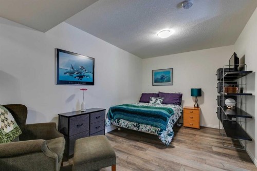 51 Spring Meadows Bay, Okotoks, AB - Indoor Photo Showing Bedroom