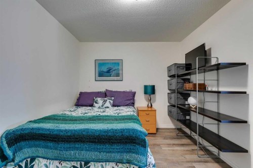 51 Spring Meadows Bay, Okotoks, AB - Indoor Photo Showing Bedroom