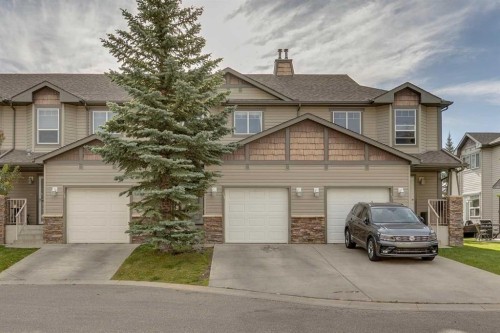 51 Spring Meadows Bay, Okotoks, AB - Outdoor With Facade